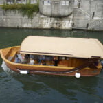 A boat sailing the Ljubljanica River