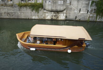 A boat sailing the Ljubljanica River