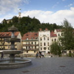 Ljubljana fountain and a luxury spectator Ljubljlana castle