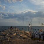 People playing next to Sant Pol de Mar's beach