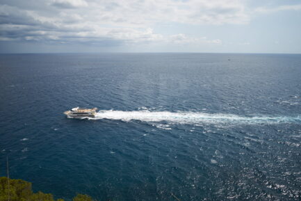 Neptune boat sailing near Tossa de Mar town
