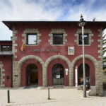 Llivia's town hall and Esteve Pharmacy museum door