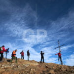 Hikers on Les Agudes Peack