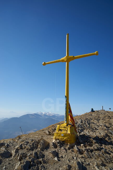 The Taga Mountain Peak cross photograph