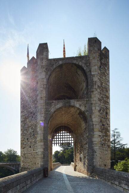 Besalú bridge tower with hard backlight