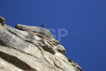 Abseiler on top to Cingles of Tavertet