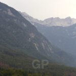 A couple rowing a Kayak inside Bohinj lake