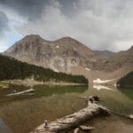 Buy a fine art canvas print of Basa de la Mora, a summer lake in the Gistain Valley near Aínsa, Spain. Museum-quality canvas picture print capturing alpine beauty and seasonal change.