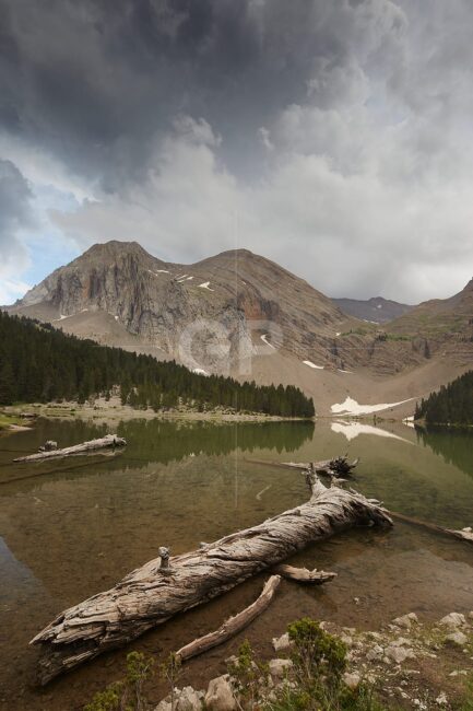 Buy a fine art canvas print of Basa de la Mora, a summer lake in the Gistain Valley near Aínsa, Spain. Museum-quality canvas picture print capturing alpine beauty and seasonal change.