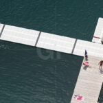 People playing on the walkways of lake Bled from a bird’s-eye view canvas print.