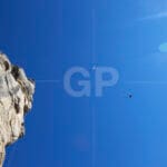 Senior abseilers carefully testing the safety of an installation in Tavertet