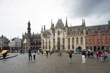 Front view photograph of the Bruges City Hall Gothic façade on the Burg square﻿